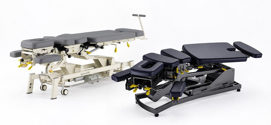Absolute 300 advanced 3D flexion-distraction chiropractic table and Fairworth Manual Drop and distraction Chiropractic table